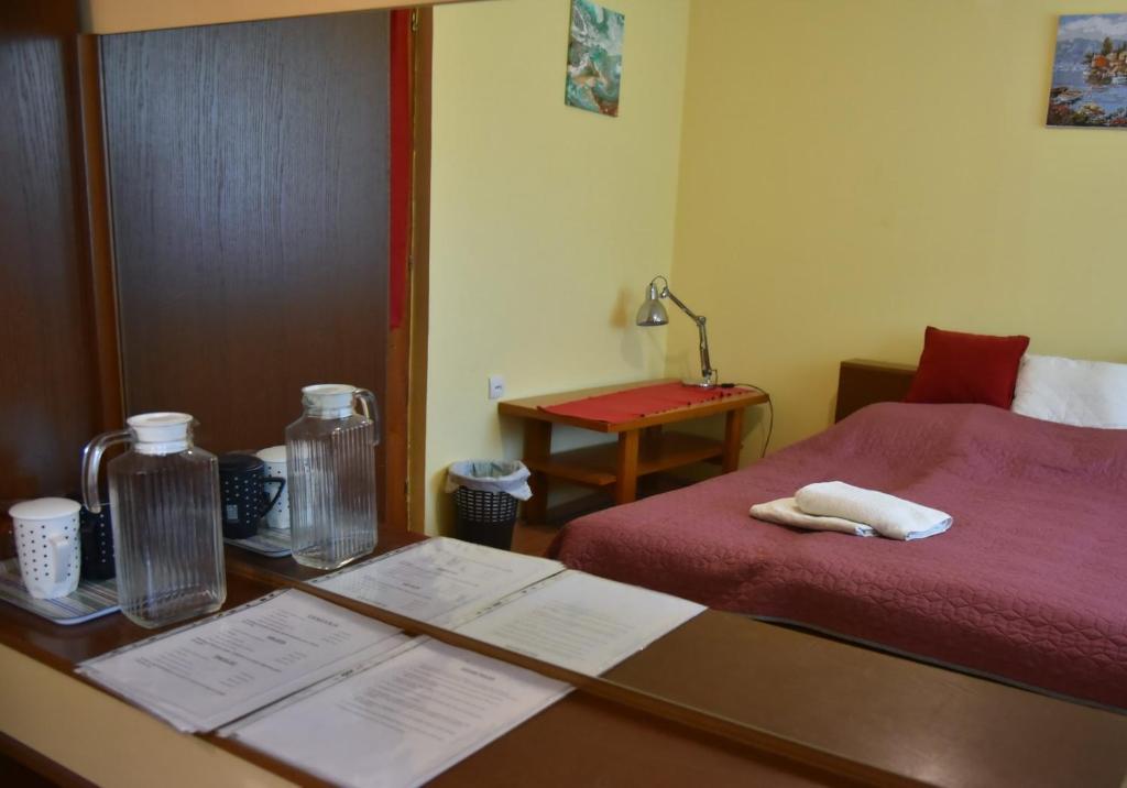 Una cama o camas en una habitación de sobe MAŠA