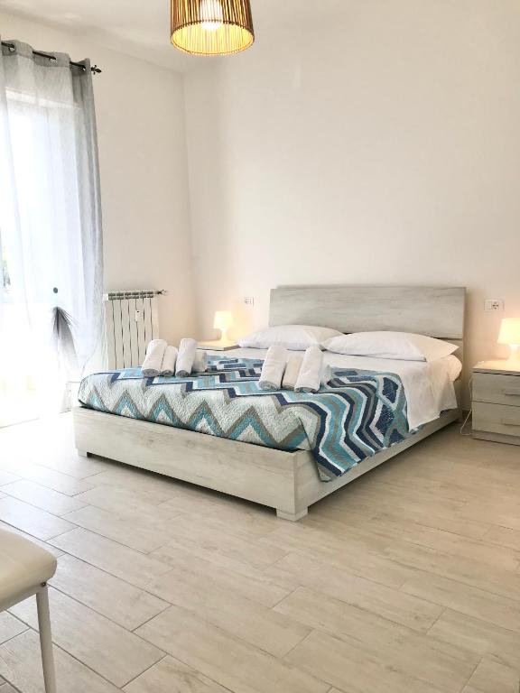 Posteľ alebo postele v izbe v ubytovaní Casa del Sole