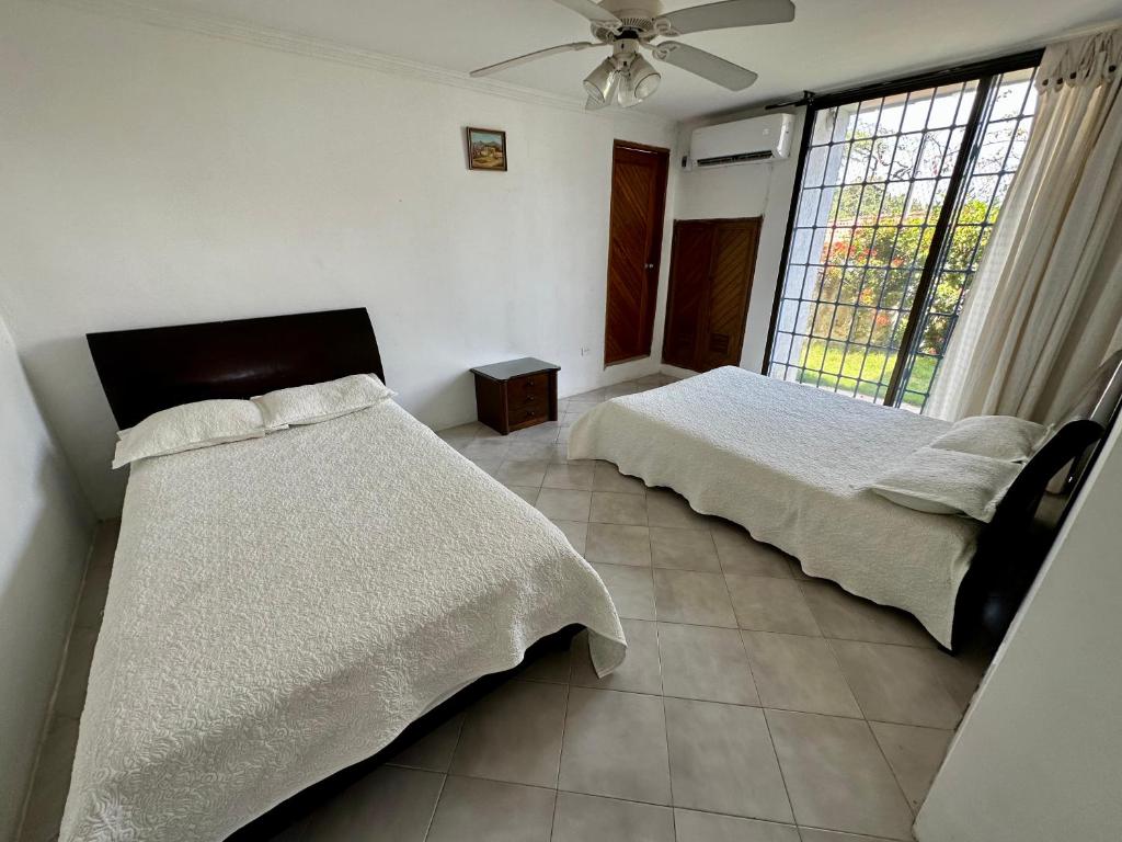 Postel nebo postele na pokoji v ubytování Casa Miramar