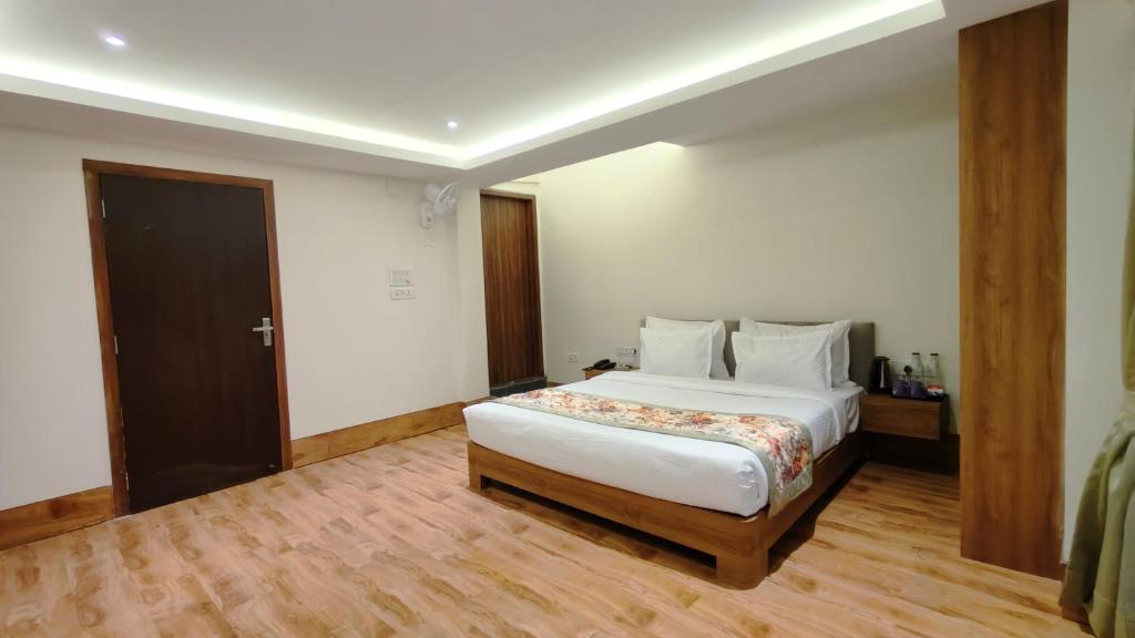 Postel nebo postele na pokoji v ubytování Mount Polaris Suites & Spa