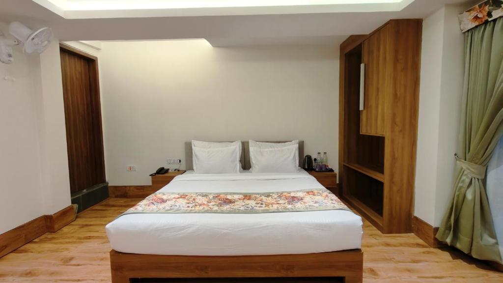 Postel nebo postele na pokoji v ubytování Mount Polaris Suites & Spa
