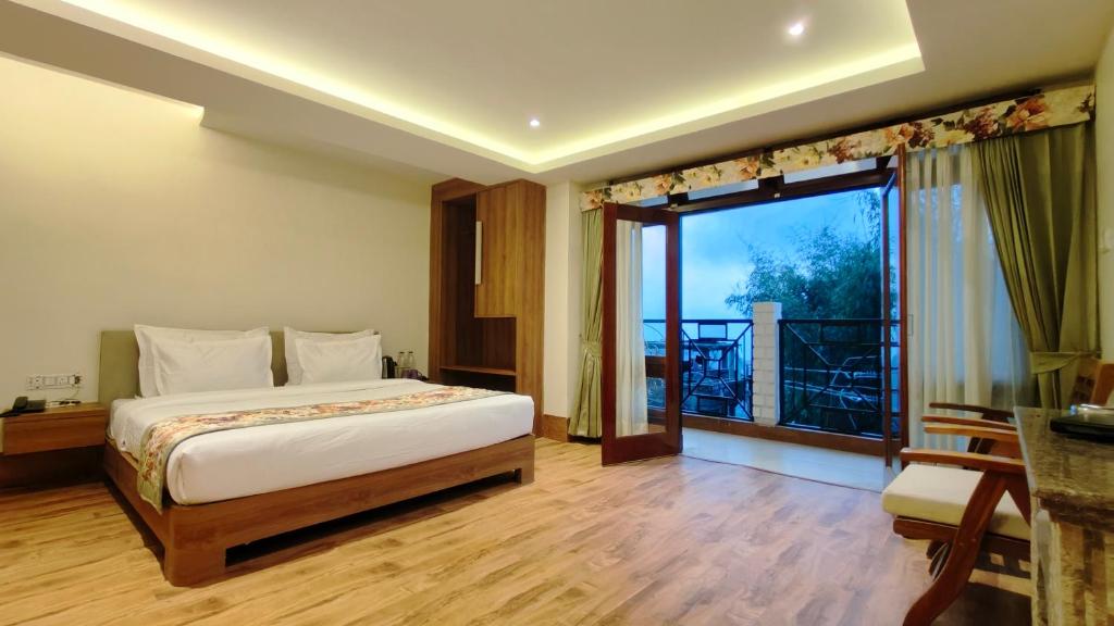 Postel nebo postele na pokoji v ubytování Mount Polaris Suites & Spa