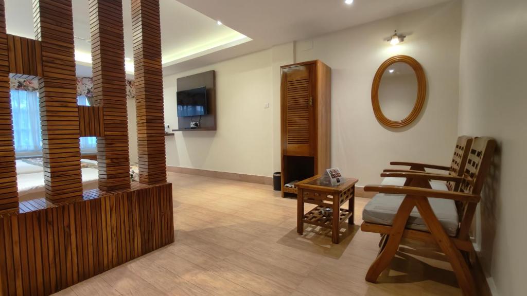 TV a/nebo společenská místnost v ubytování Mount Polaris Suites & Spa
