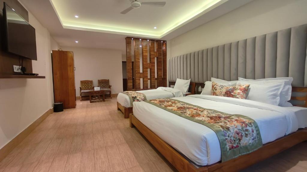 Postel nebo postele na pokoji v ubytování Mount Polaris Suites & Spa