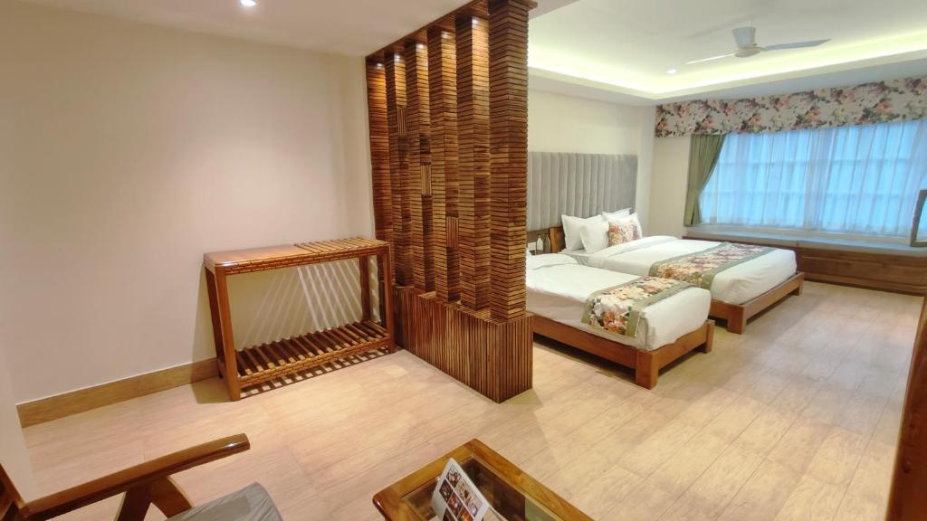 Postel nebo postele na pokoji v ubytování Mount Polaris Suites & Spa