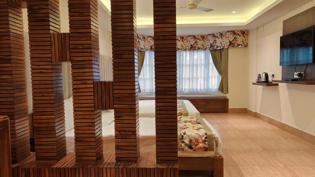 TV a/nebo společenská místnost v ubytování Mount Polaris Suites & Spa