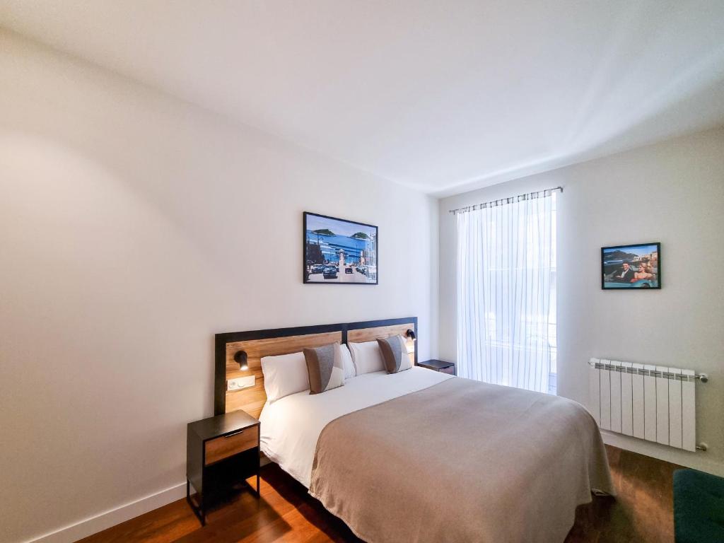 Posteľ alebo postele v izbe v ubytovaní San Bartolome Bay - Iberorent Apartments