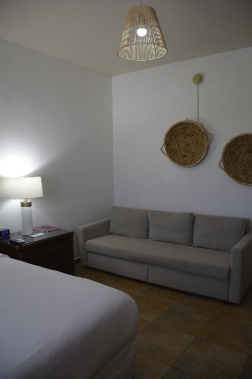 Postel nebo postele na pokoji v ubytování Turtle Bay Inn