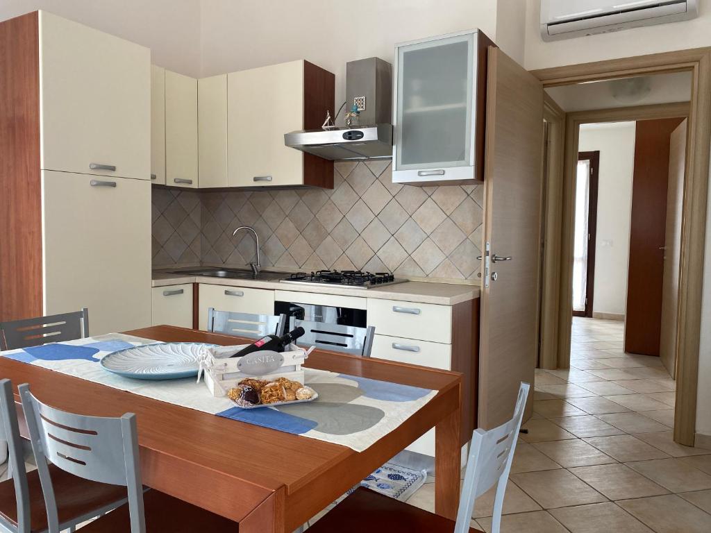 Casita Porto Pino - Accogliente Casa Vacanze sul Mare
