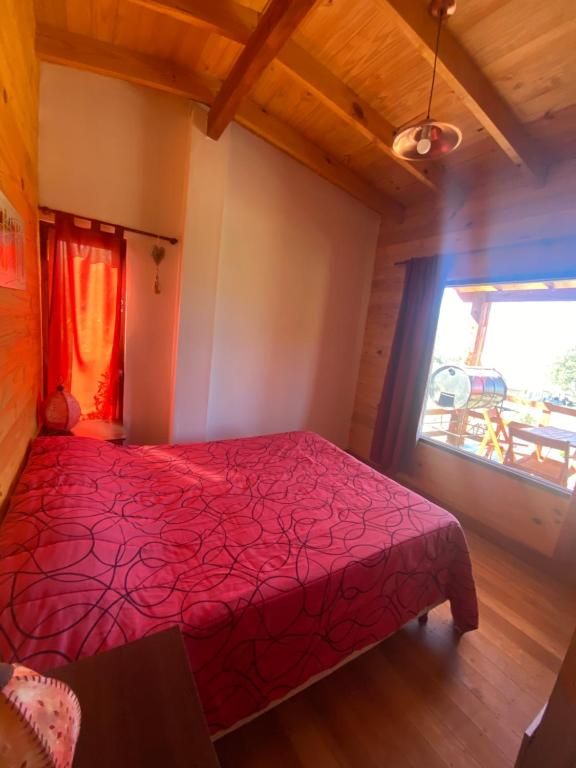 Postel nebo postele na pokoji v ubytování Cabaña El Churqui