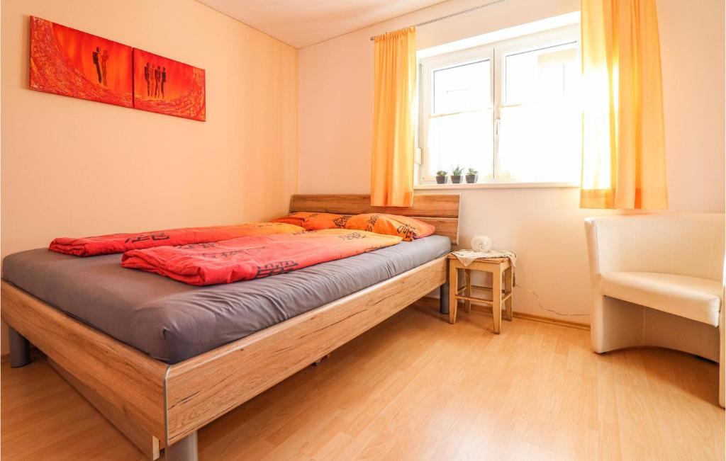 Postel nebo postele na pokoji v ubytování Ferienwohnung Mit Gartenzaun