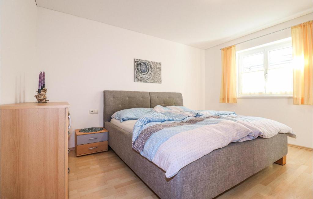Postel nebo postele na pokoji v ubytování Ferienwohnung Mit Gartenzaun
