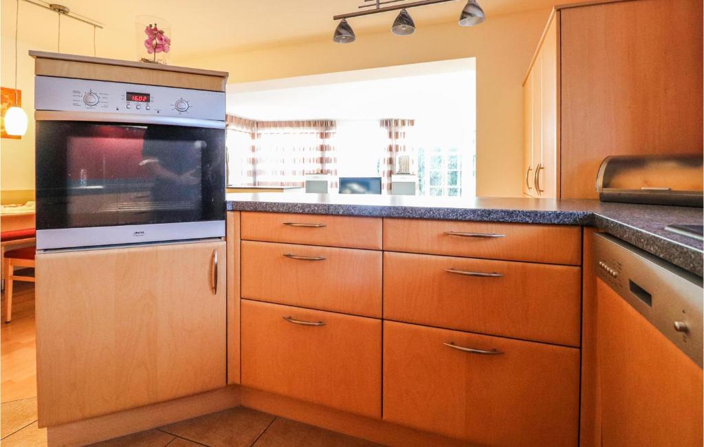 Kuchyň nebo kuchyňský kout v ubytování Ferienwohnung Mit Gartenzaun