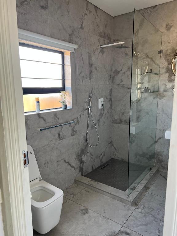 Vannituba majutusasutuses Swan Lake Suites