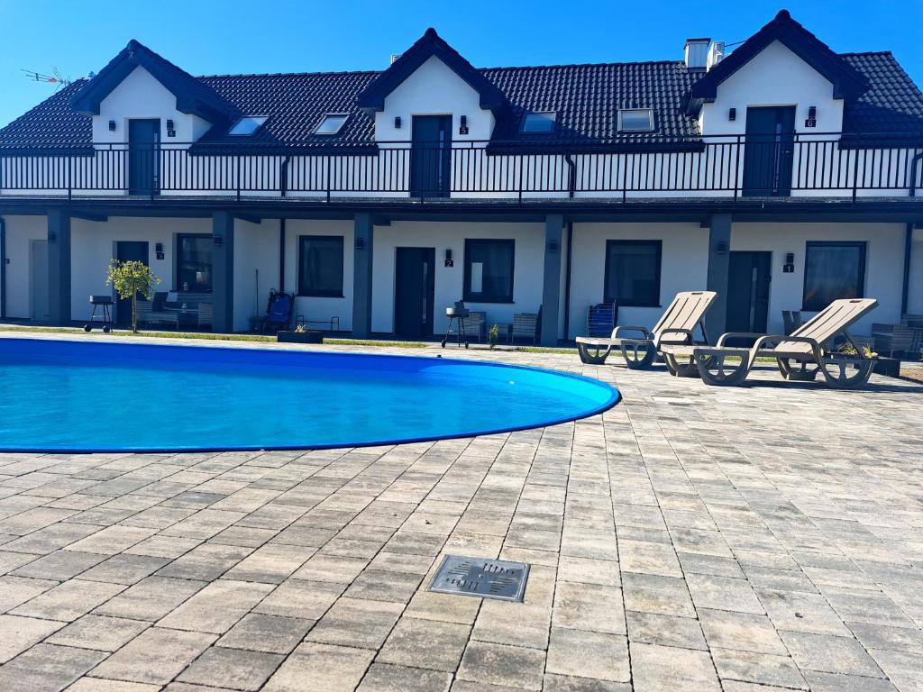 Bazén v ubytování Apartamenty Bursztynowa Zatoka - Łeba - Nowęcin nebo v jeho okolí
