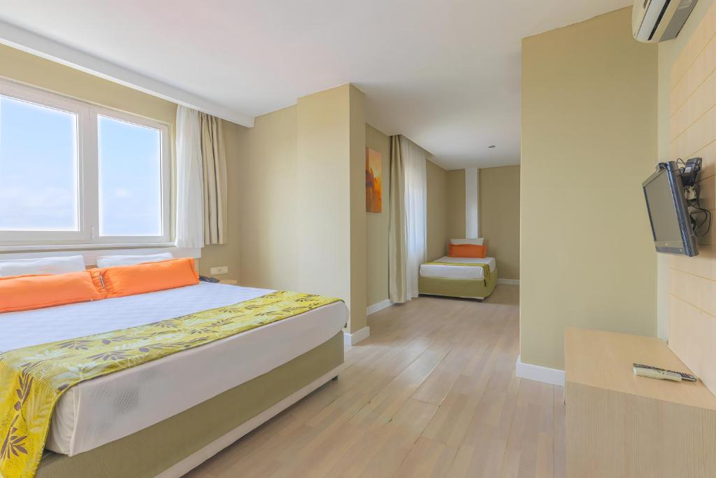 Postel nebo postele na pokoji v ubytování Akdora Elite Hotel & Spa