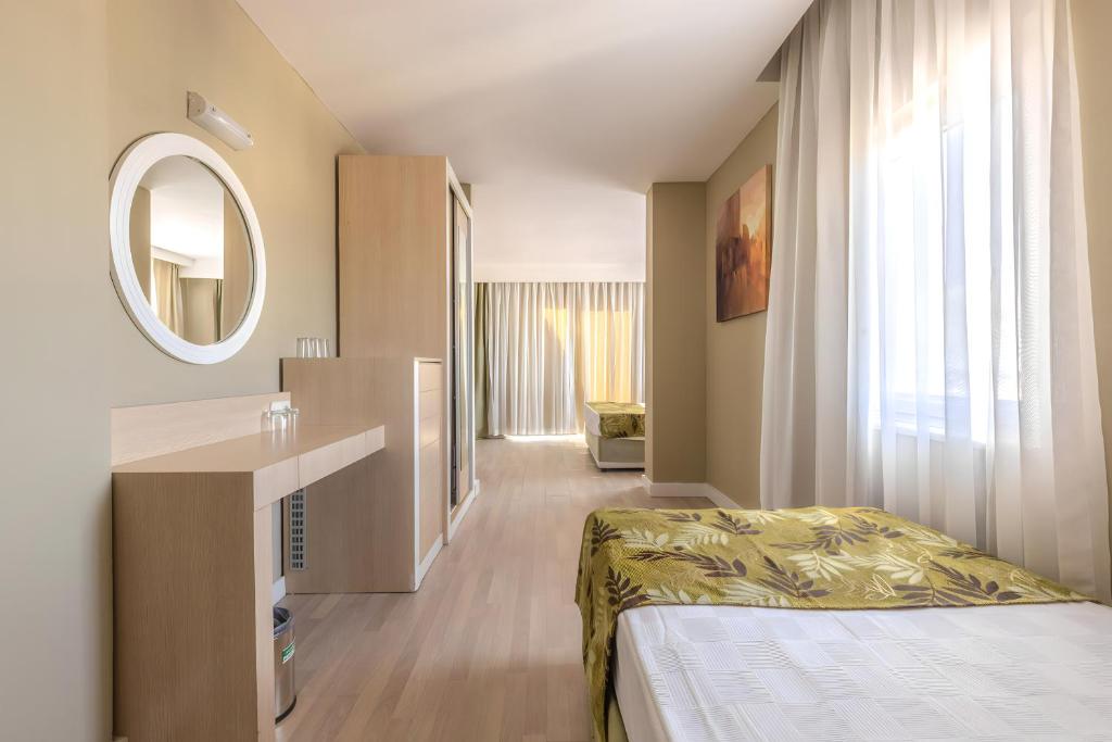 Postel nebo postele na pokoji v ubytování Akdora Elite Hotel & Spa
