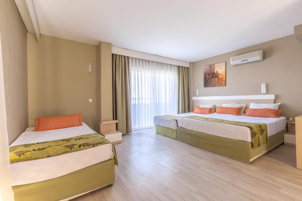 Postel nebo postele na pokoji v ubytování Akdora Elite Hotel & Spa