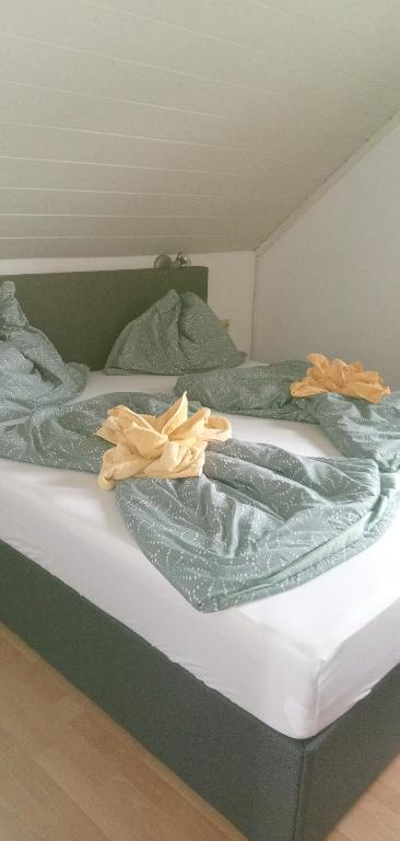 Postel nebo postele na pokoji v ubytování Ferienwohnungen Miklautsch