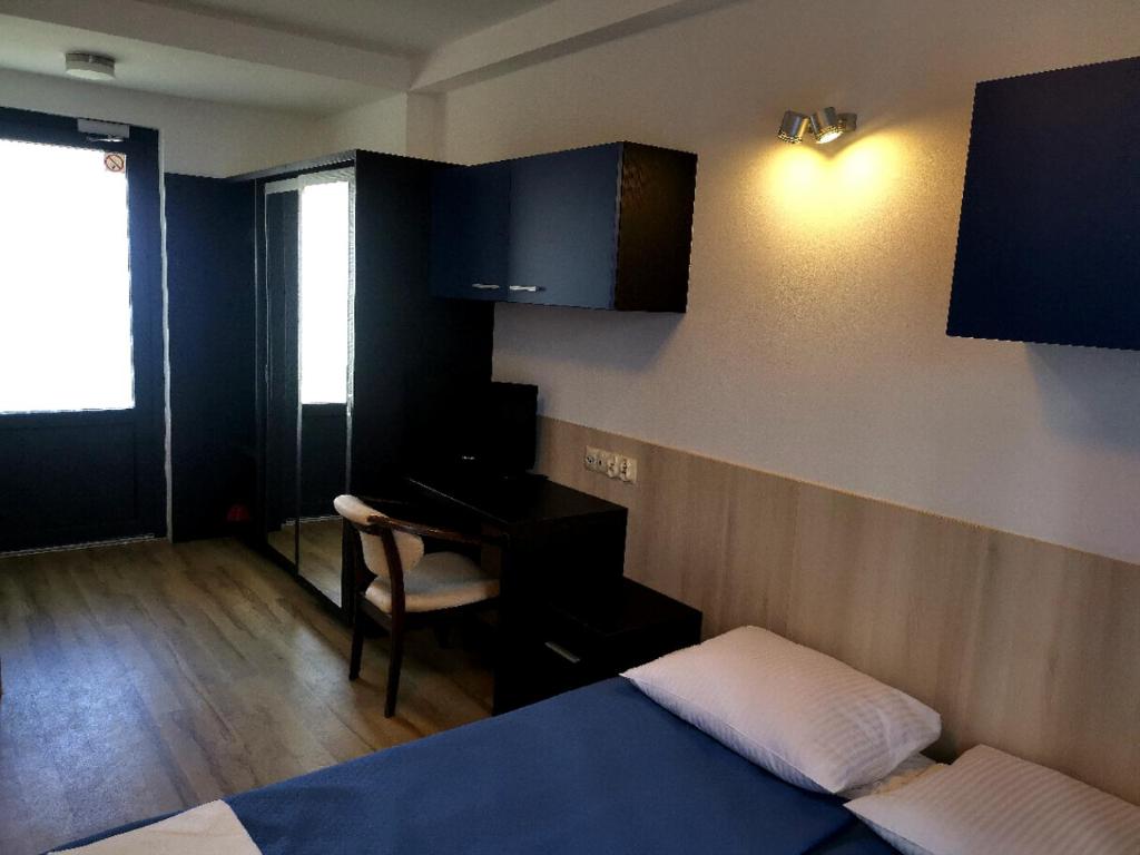 Postel nebo postele na pokoji v ubytování OW Posejdon