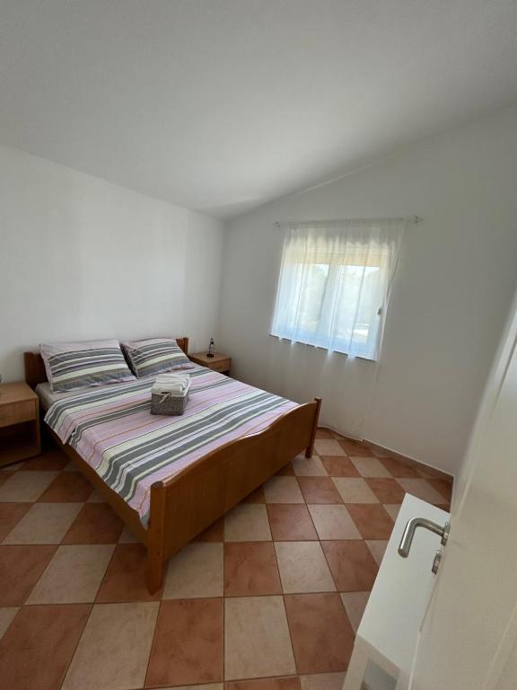 Posteľ alebo postele v izbe v ubytovaní Apartments Duda