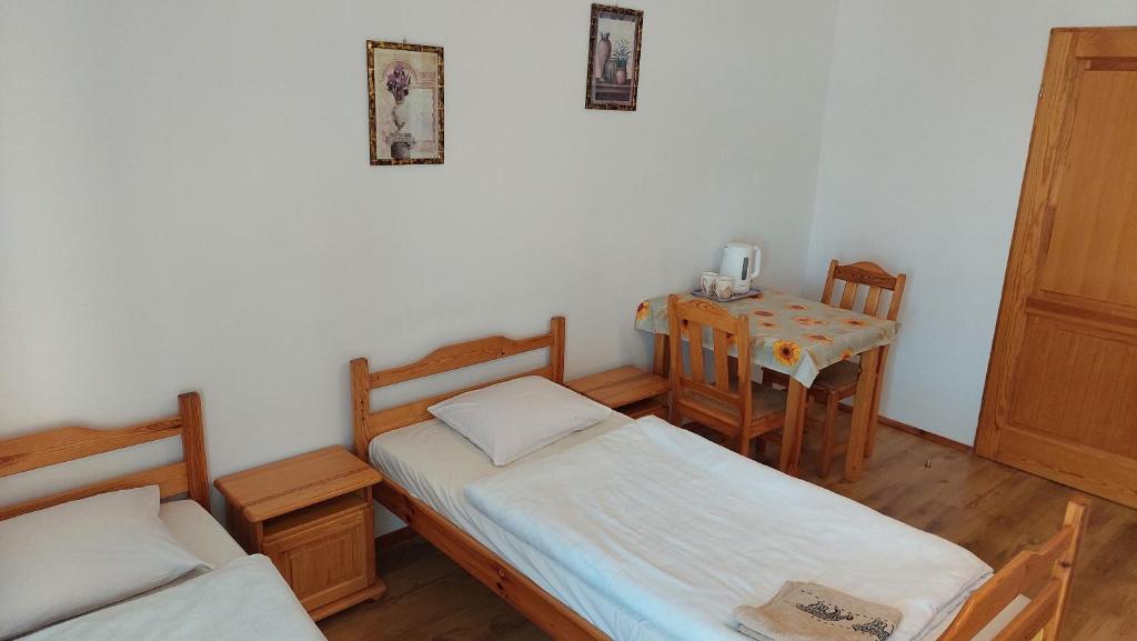 Postel nebo postele na pokoji v ubytování Na Wzgórzu
