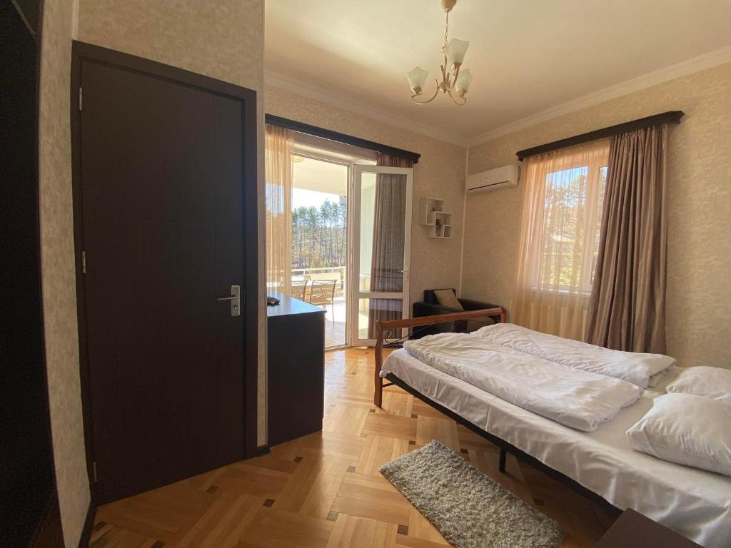 Postel nebo postele na pokoji v ubytování Neli & Zaal Guest House