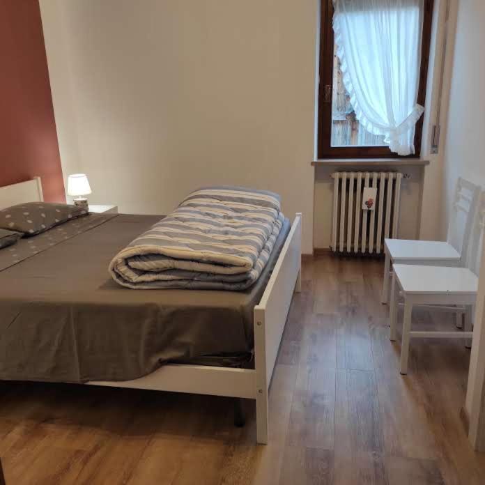 Postel nebo postele na pokoji v ubytování Da Carla Dolomiti Val di Zoldo
