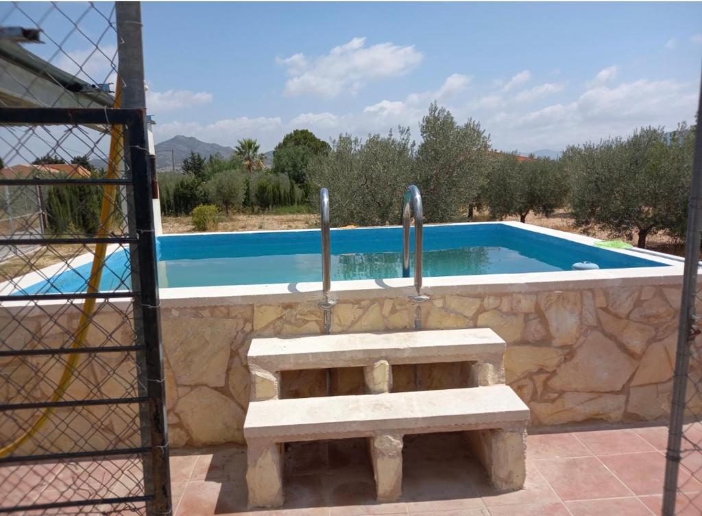 Bazén v ubytování Agradable Casa de campo nebo v jeho okolí