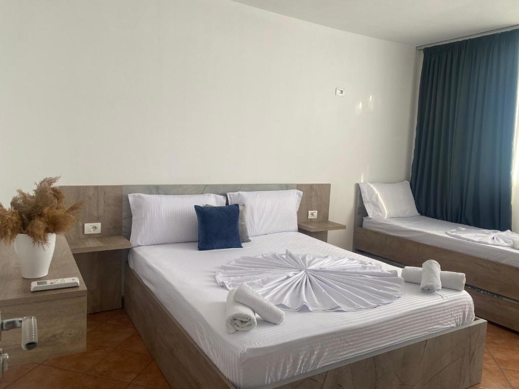 Postel nebo postele na pokoji v ubytování Kenza apartment
