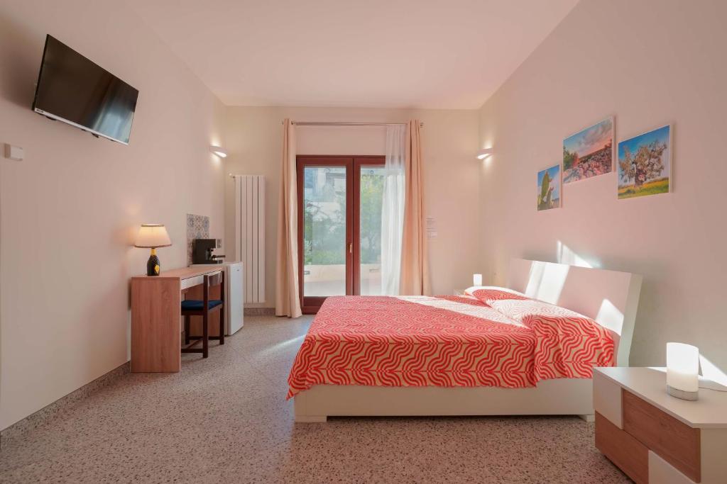 Postel nebo postele na pokoji v ubytování Le tre zie B&B