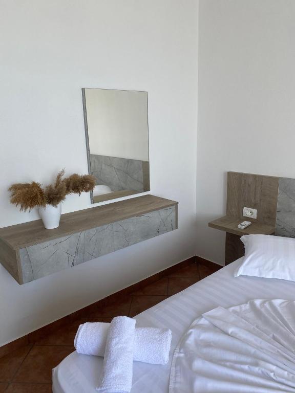 Postel nebo postele na pokoji v ubytování Kenza apartment