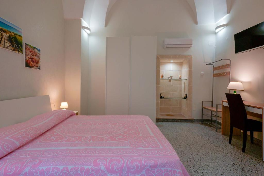 Postel nebo postele na pokoji v ubytování Le tre zie B&B