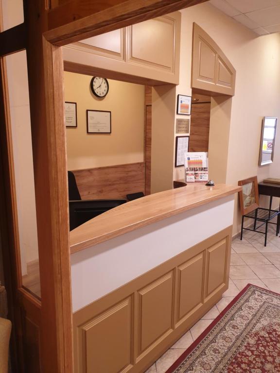 Kuchyň nebo kuchyňský kout v ubytování Art Garni Hotel