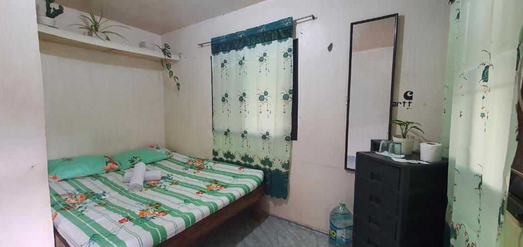 Postel nebo postele na pokoji v ubytování Jea's Room Rental