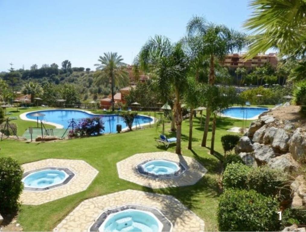 Bazén v ubytovaní La Reserva Beach & Golf Apartment alebo v jeho blízkosti