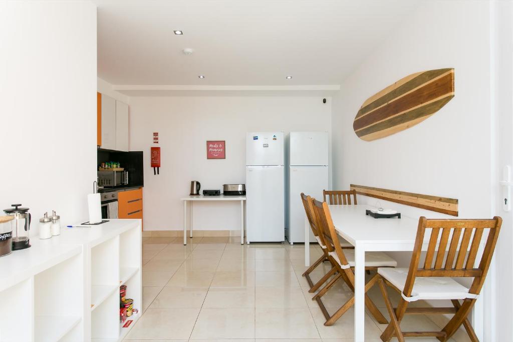 Kuchyň nebo kuchyňský kout v ubytování Casa Amarela Guesthouse