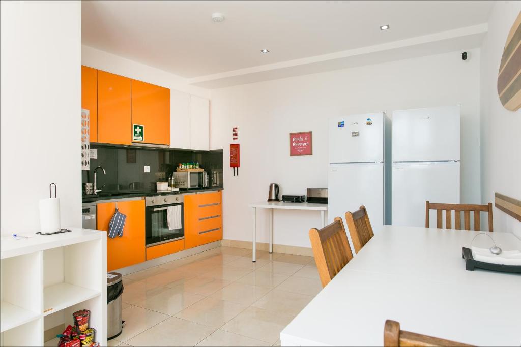 Kuchyň nebo kuchyňský kout v ubytování Casa Amarela Guesthouse