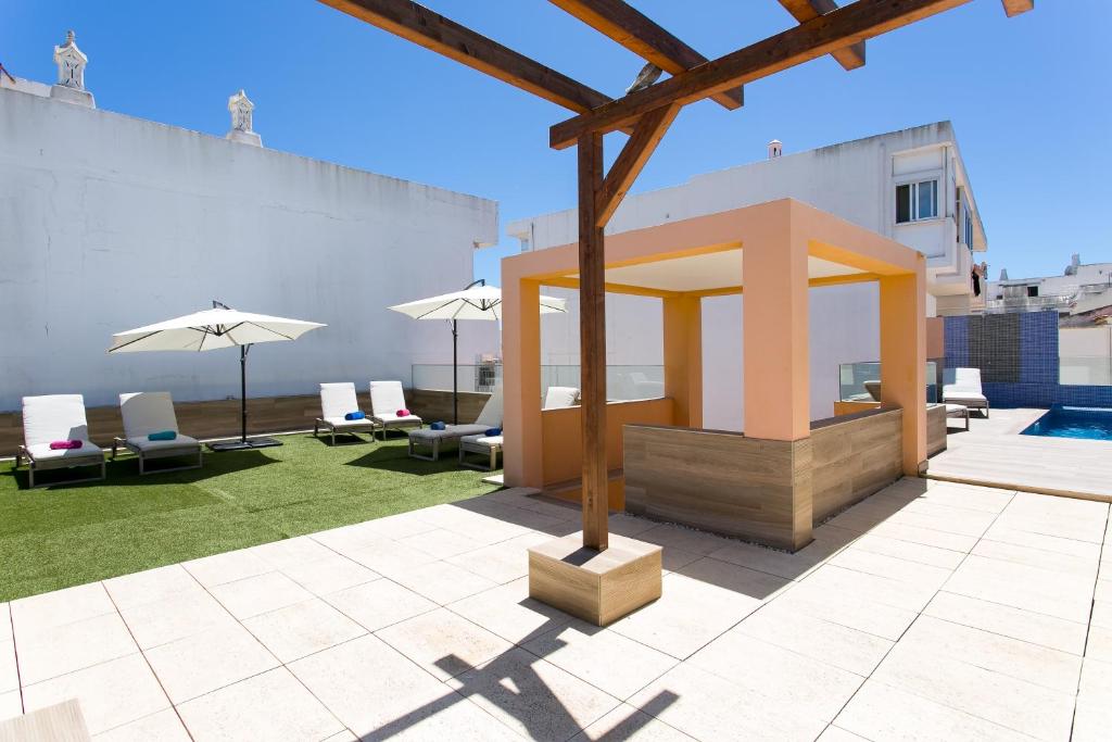 Patio nebo venkovní prostory v ubytování Casa Amarela Guesthouse
