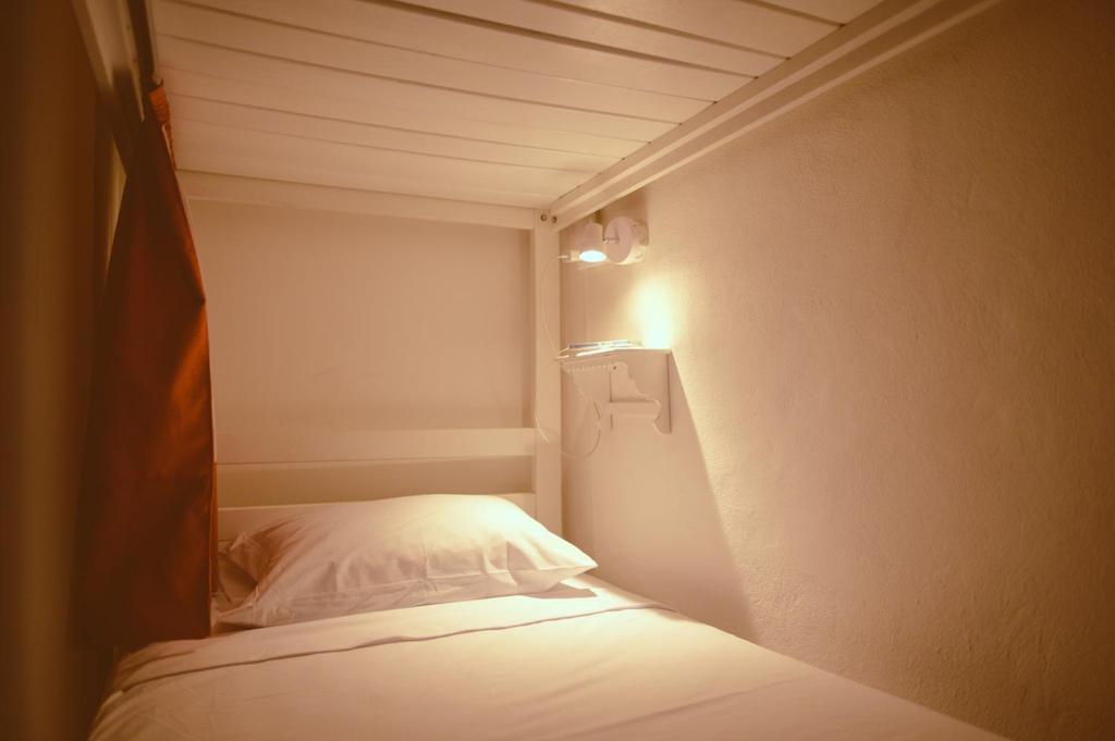 Postel nebo postele na pokoji v ubytování Macarena Hostel