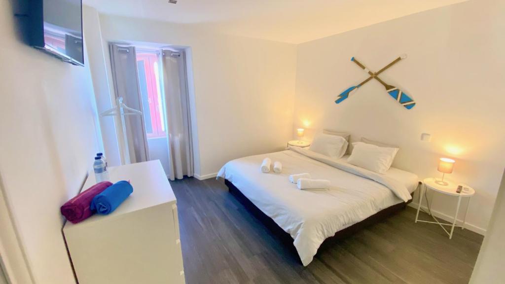 Postel nebo postele na pokoji v ubytování Casa Amarela Guesthouse