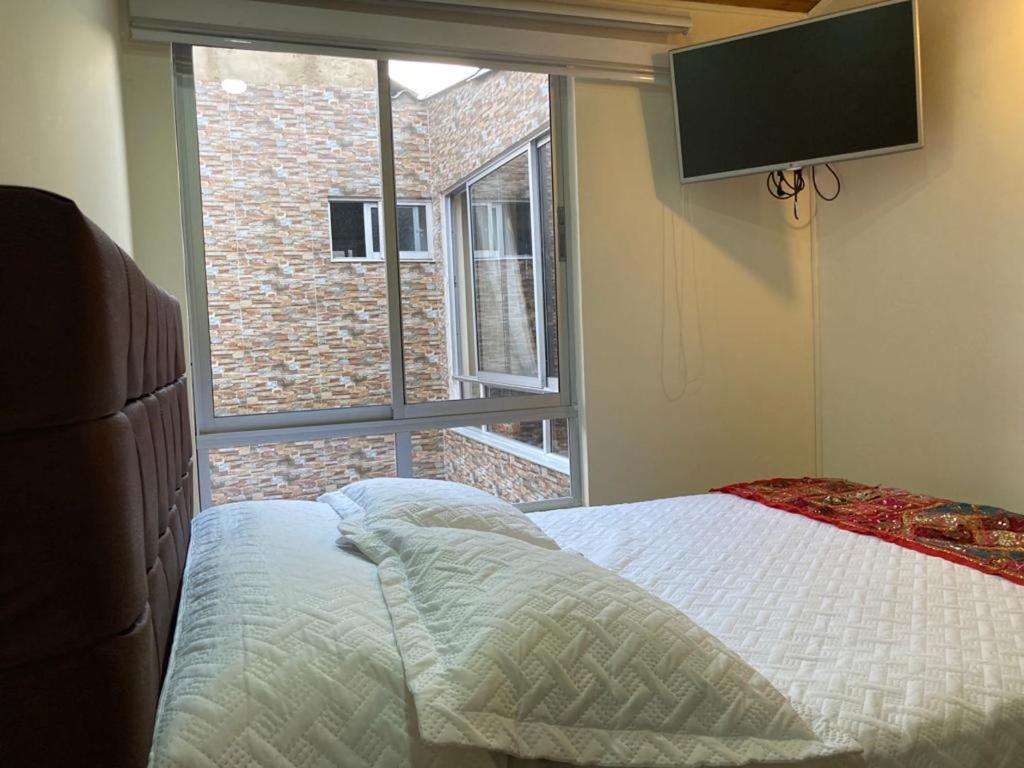 Postel nebo postele na pokoji v ubytování Como en casa