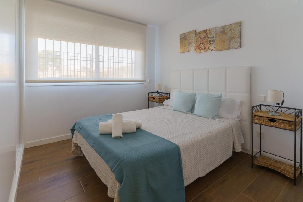 Posteľ alebo postele v izbe v ubytovaní Casa Bluebelle Guadalmina