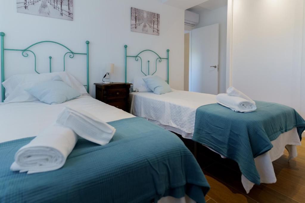 Posteľ alebo postele v izbe v ubytovaní Casa Bluebelle Guadalmina