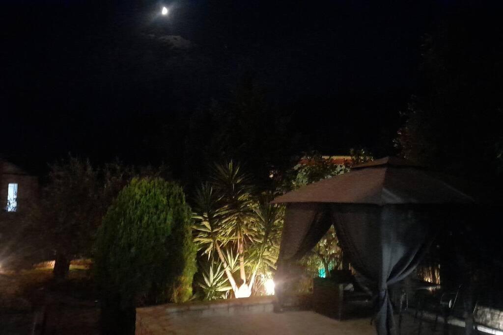 A garden outside OUTParga Apartment 3