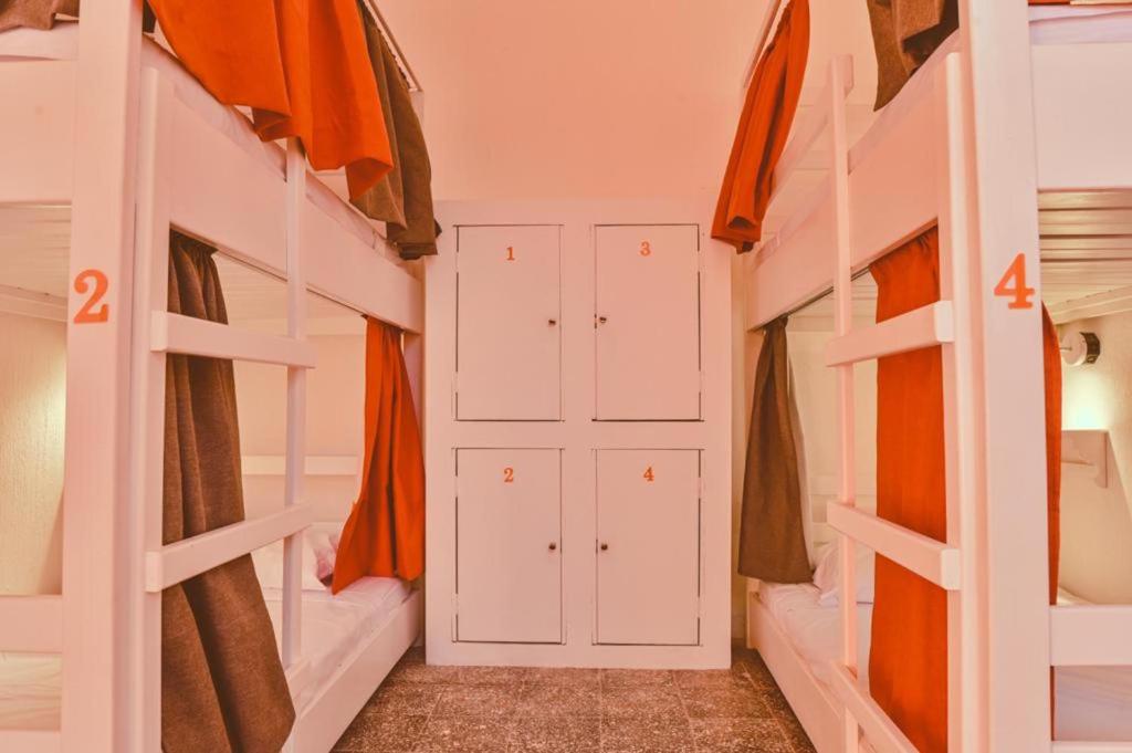 Postel nebo postele na pokoji v ubytování Macarena Hostel