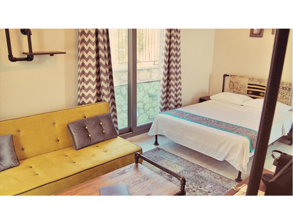 A bed or beds in a room at Brera Alacati - Special Category