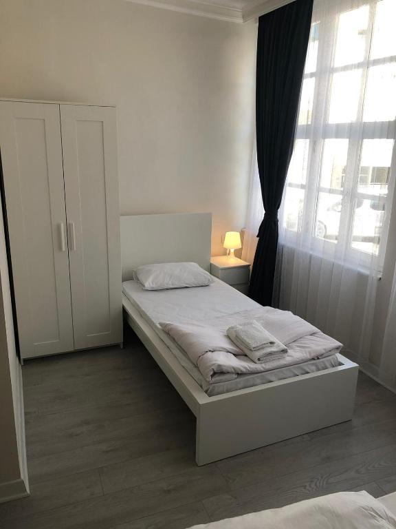 Postel nebo postele na pokoji v ubytování ATICI HOTEL