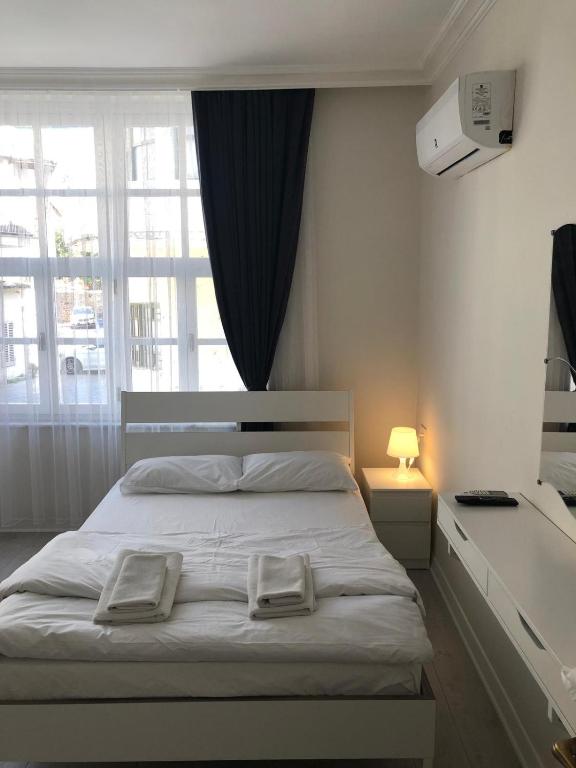 Postel nebo postele na pokoji v ubytování ATICI HOTEL