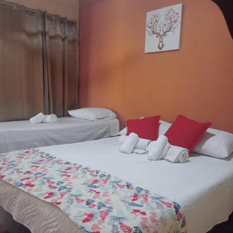 Postel nebo postele na pokoji v ubytování El Cocobolo Food&Rest Room 4 Bed and Breakfast WiFi AC Pkg gratis